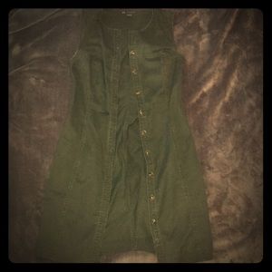A dark green jacket/or dress.
